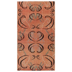 Tappeto Zeki Müren vintage in color pesca con motivi geometrici colorati da Rug & Kili