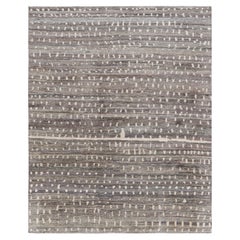 Tapis de style marocain de Rug & Kilim en gris avec des motifs géométriques blancs sur toute la surface.