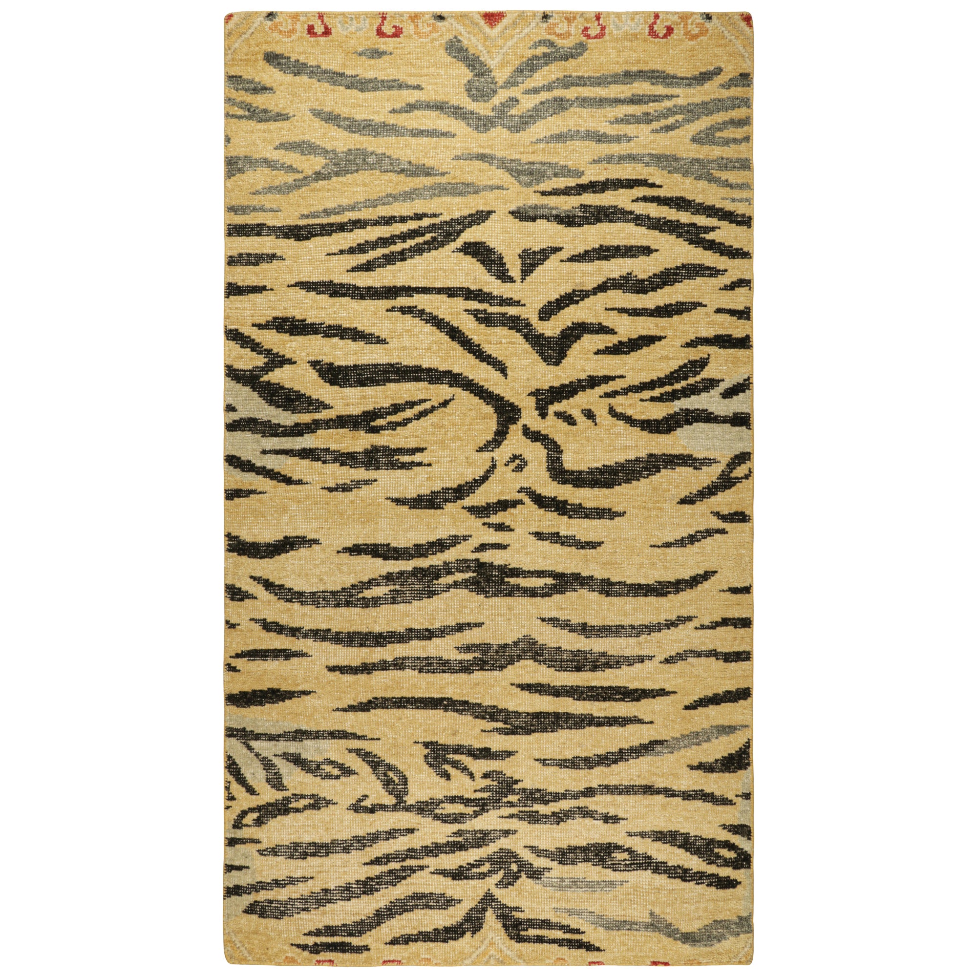 Rug & Kilim’s Distressed Tiger Skin Rug in Gold, Black and Gray Tones