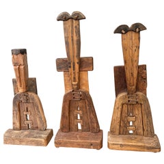 A trio of carved wood primitive sculptures by Luciano Bertolotto