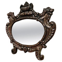 Italian finely crafted oval wall mirror in silvered copper, early 1900s