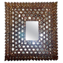 Miroir espagnol en bois doré
