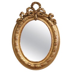 19th Century French Louis XVI Carved Giltwood Oval Wall Mirror