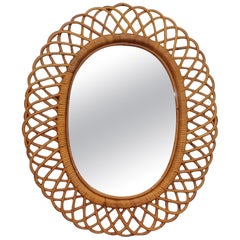Specchio da parete ovale in rattan e bambù, Italia 1960