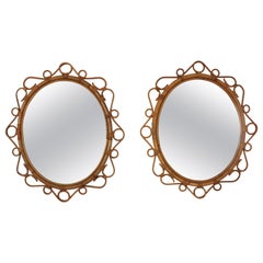 Paire de miroirs ovales espagnols en rotin et bambou, années 1960