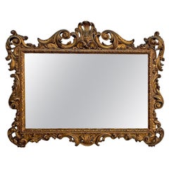 Italian Antique rectangular wall mirror with decorated golden wood frame, 1850s