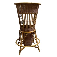 A rattan bar with stools