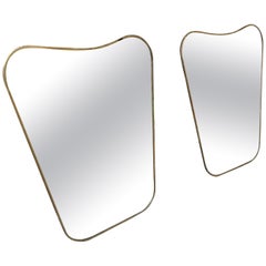 Two Gio Ponti Style Mid-Century Modern Brass Italian Biscuit Shaped Wall Mirrors