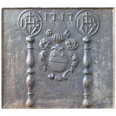 Plaque de cheminée / dosseret aux armes de France du XVIIIe siècle