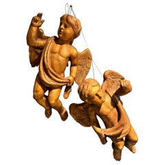 A pair of 18th century Austrian winged cherubs