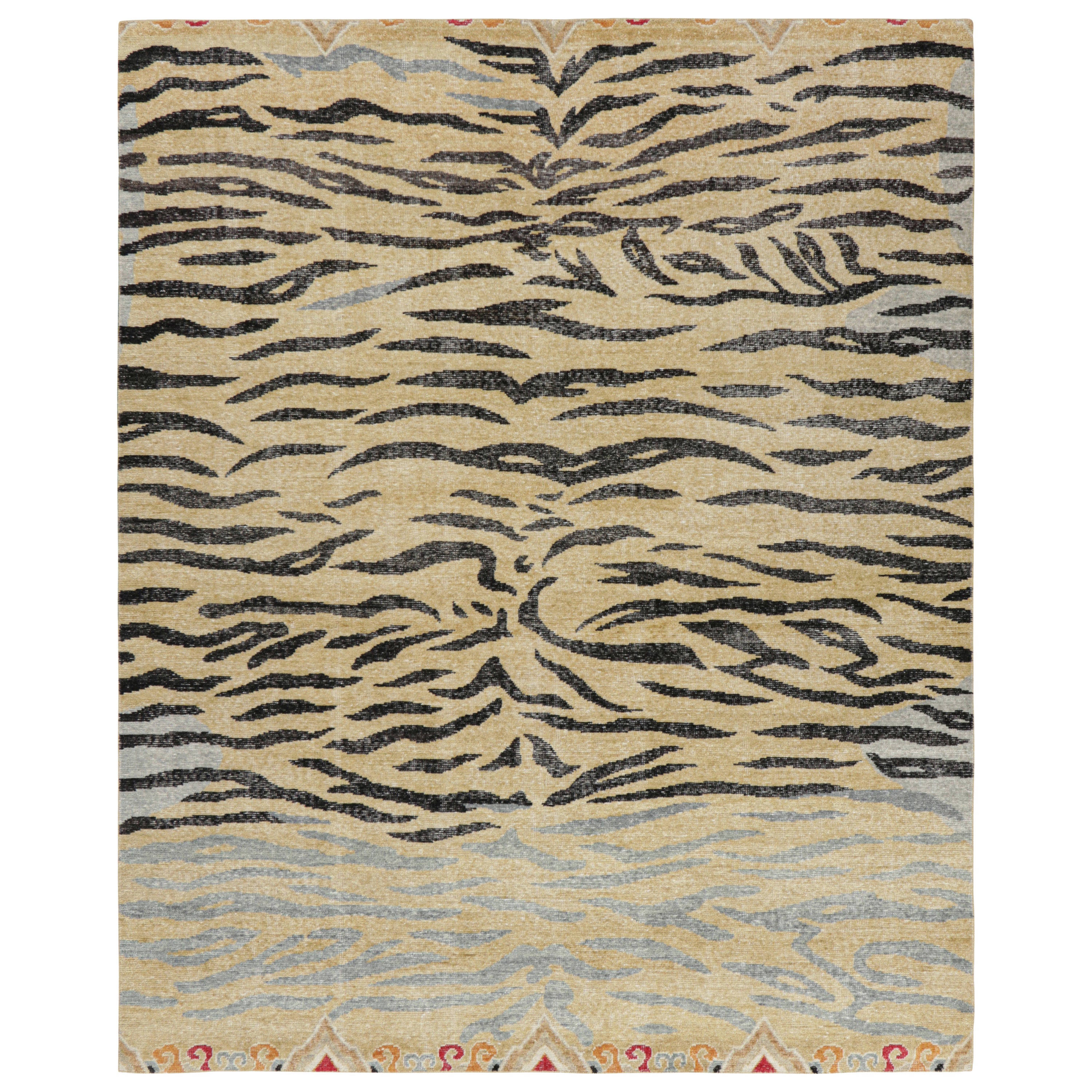 Rug & Kilim’s Distressed Tiger Skin Rug in Gold, Black and Gray Tones