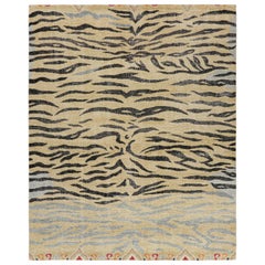 Rug & Kilim’s Distressed Tiger Skin Rug in Gold, Black and Gray Tones
