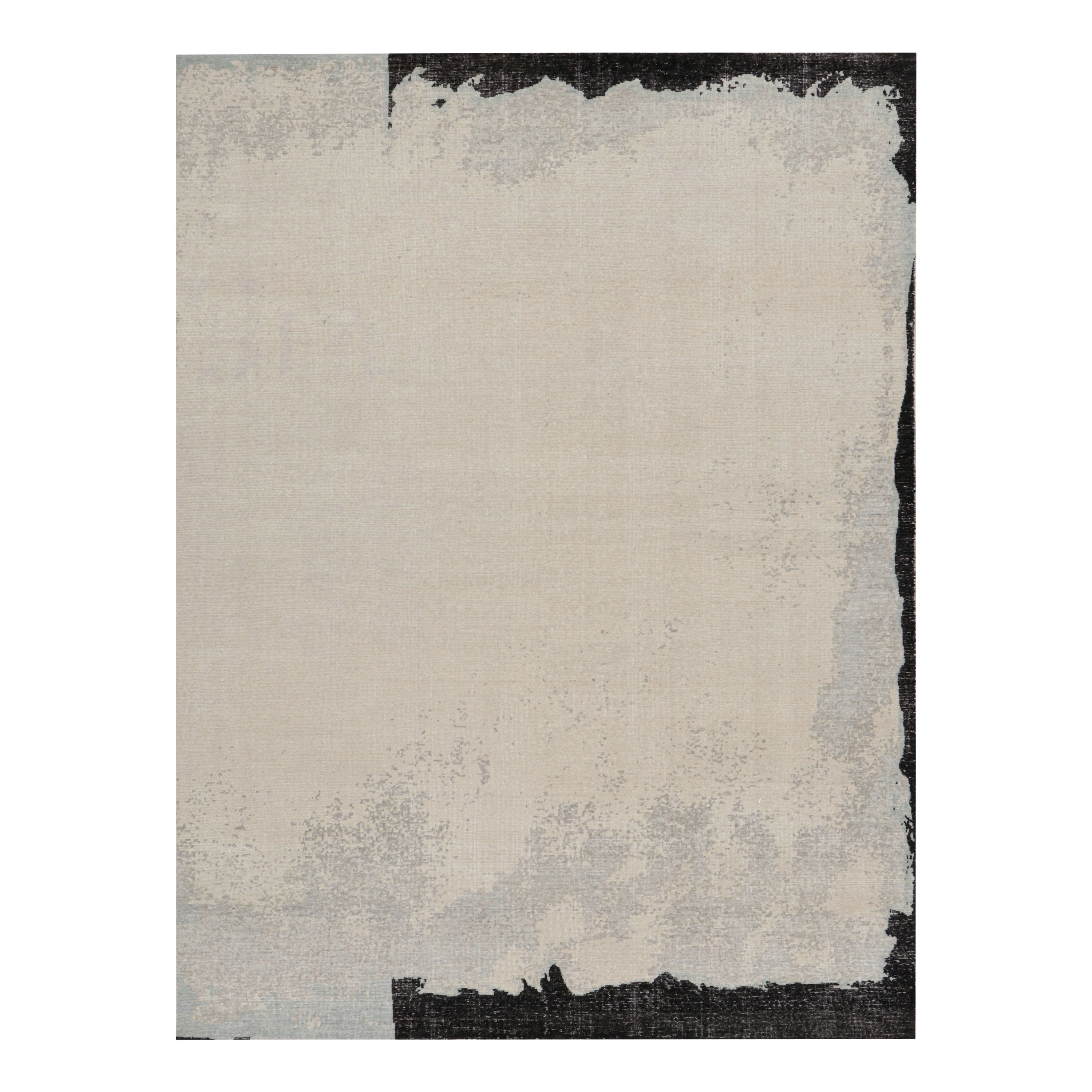 Rug & Kilim è un tappeto astratto moderno e invecchiato nei toni del beige, del grigio e del nero.