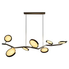 Lampade a sospensione a isola - Design a cerchi in ottone e vetro
