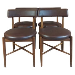 Set di quattro sedie in legno di teak e pelle, 1960