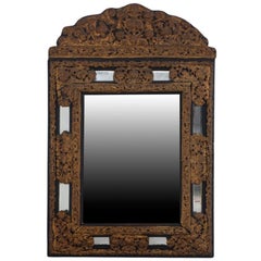 Dutch wood and embossed brass mirror, 19th C.