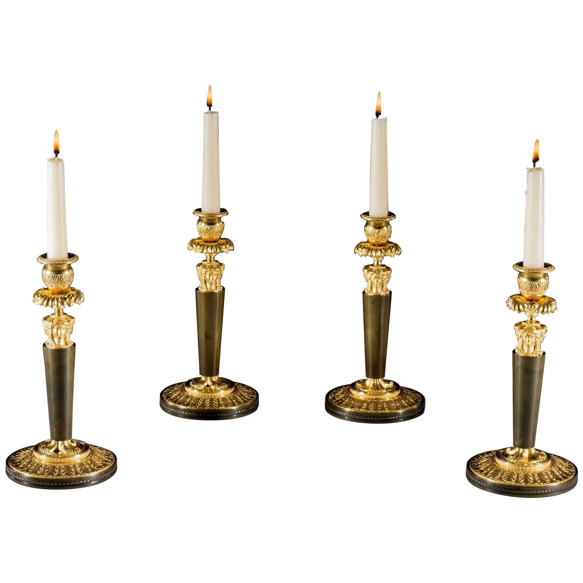 Un bel ensemble de quatre chandeliers Empire par Claude Galle