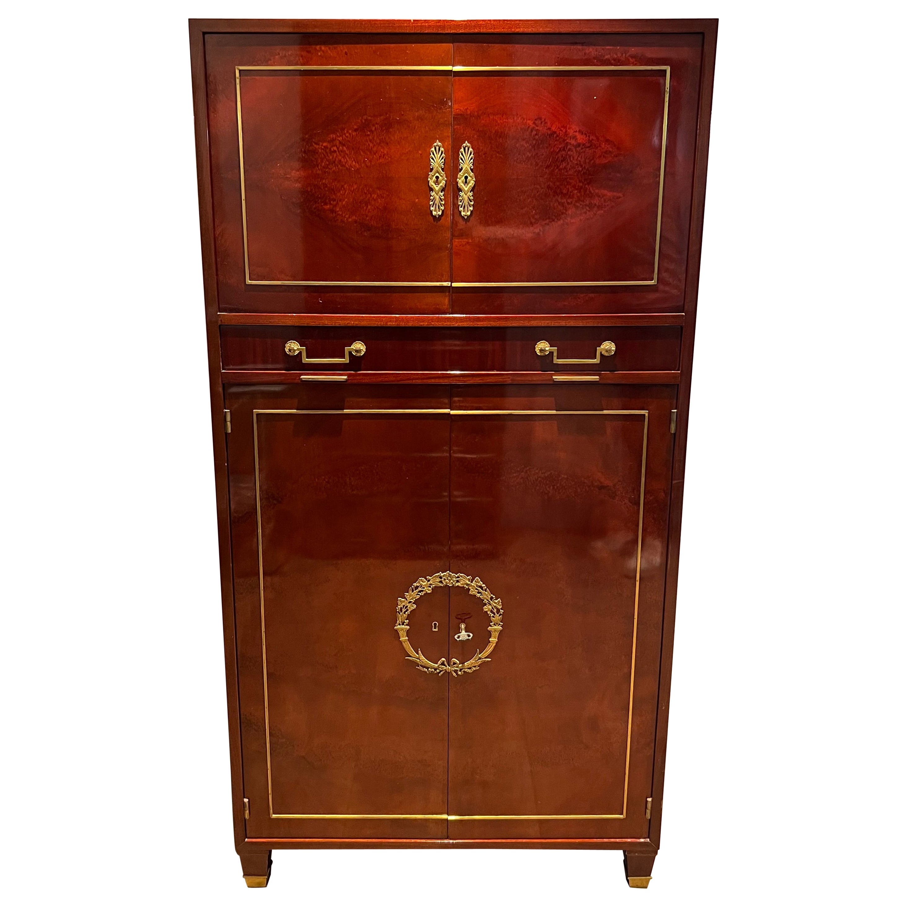 Empire style secretary desk in flamed mahogany in the style of Aldo Tura work