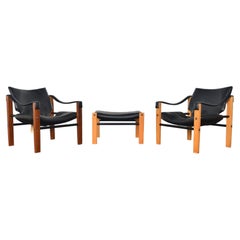 Pareja de sillones safari Maurice Burke + otomana