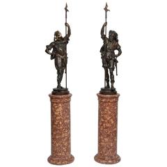 Pair of French Patinated Metal Figures of Warriors on Scagliola Pedestals