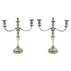 Coppia di antichi candelabri convertibili inglesi in argento Sheffield con tabacchiera.