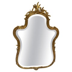 Ravissant miroir mural Friedman Brothers en gesso doré