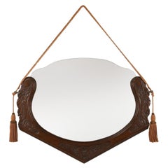 French Art Deco mirror in oak with floral carvings, 1940s