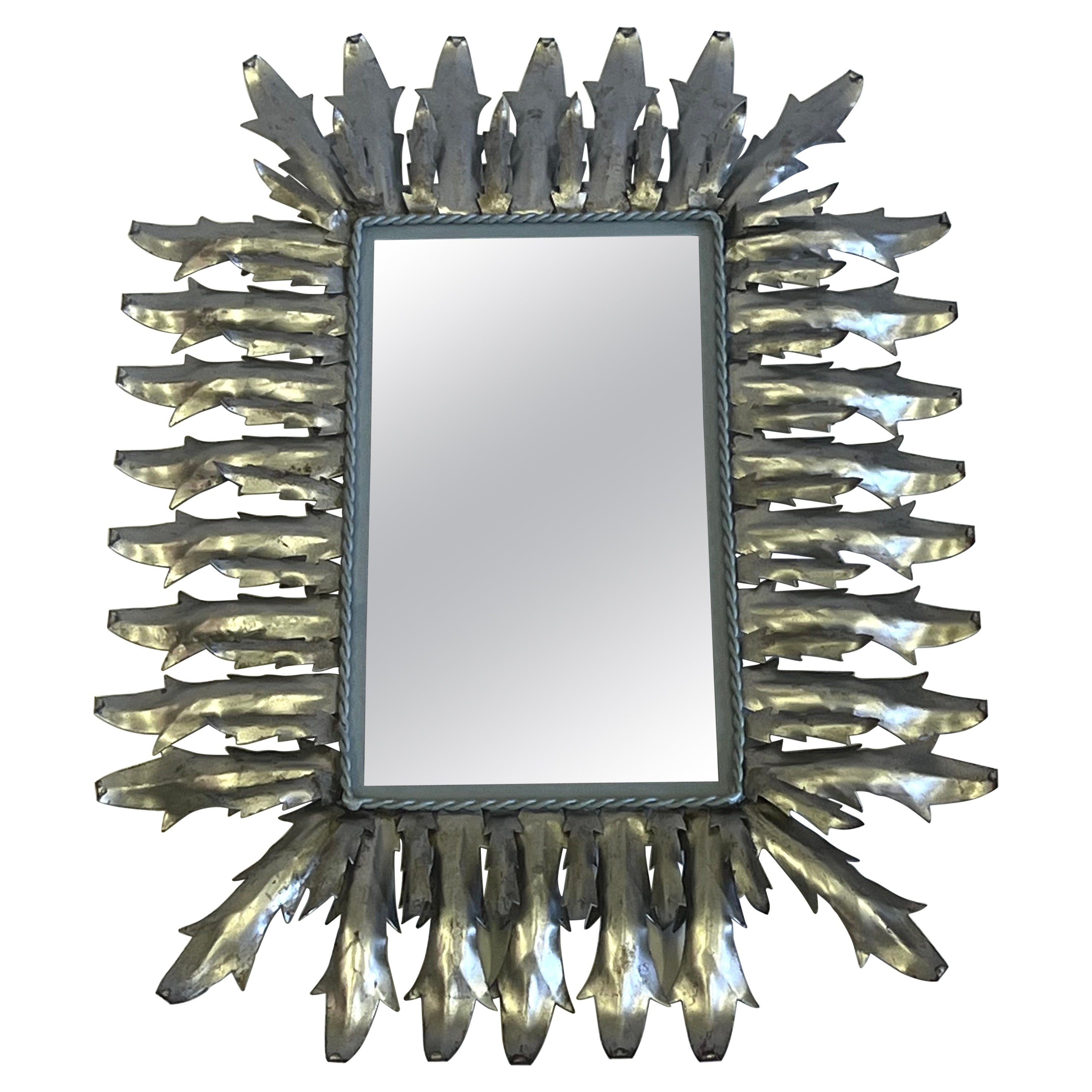 Miroir mural néoclassique français en acier et étain Sunburst, Gilbert Poillerat en vente