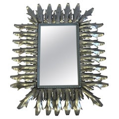 Miroir mural néoclassique français en acier et étain Sunburst, Gilbert Poillerat
