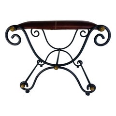 Banc vintage en fer forgé et cuir.