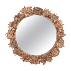 Ornate foliate convex mirror. Contemporary.