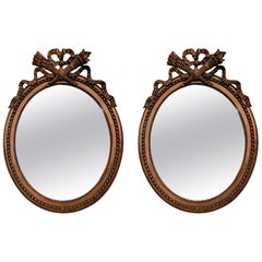 Pair Antique French Gold Leaf Oval Mirrors, Circa 1885-1895.