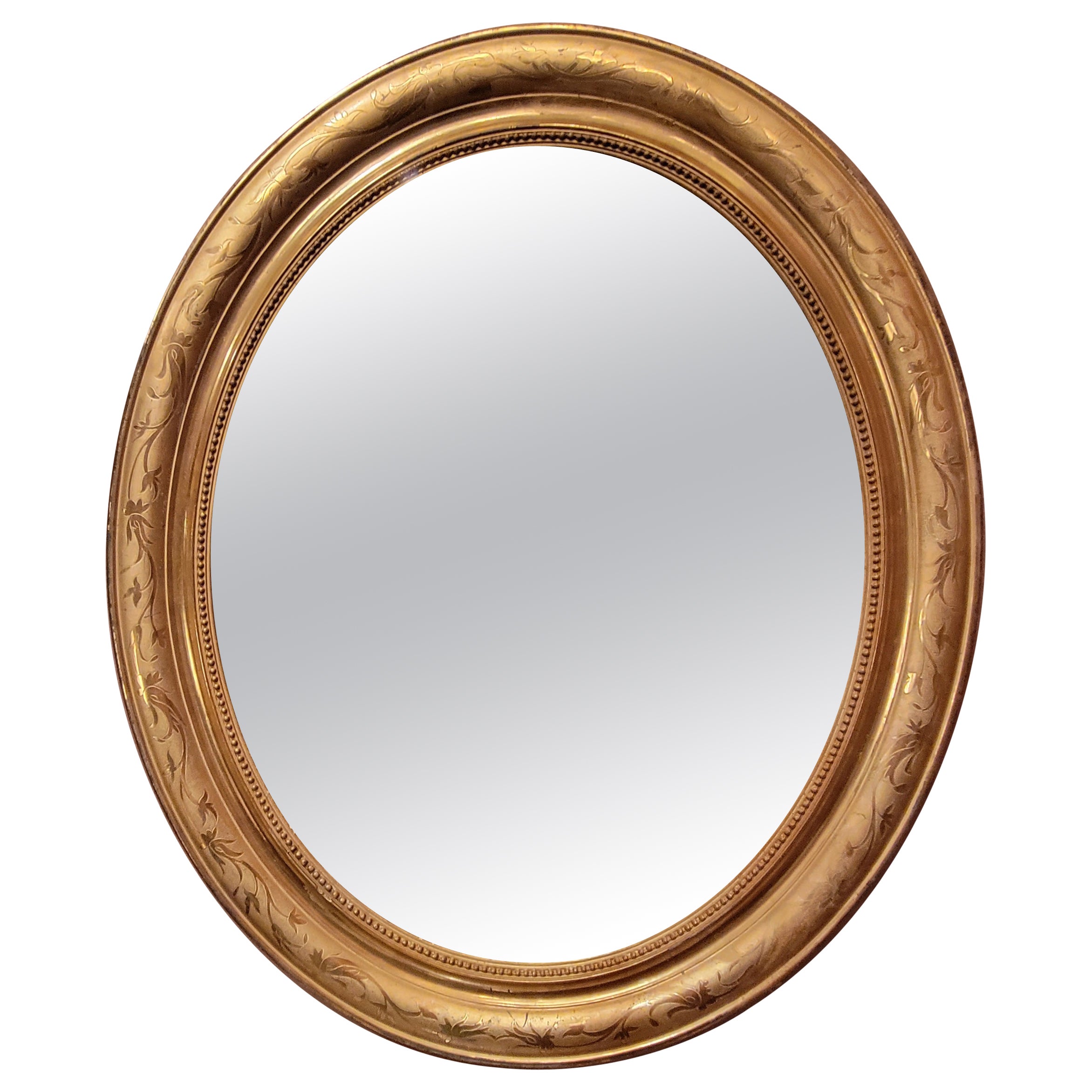 Pair Antique French Louis Philippe Gold Leaf Oval Mirrors, Circa 1890.
A nice pair of antique oval French mirrors.
