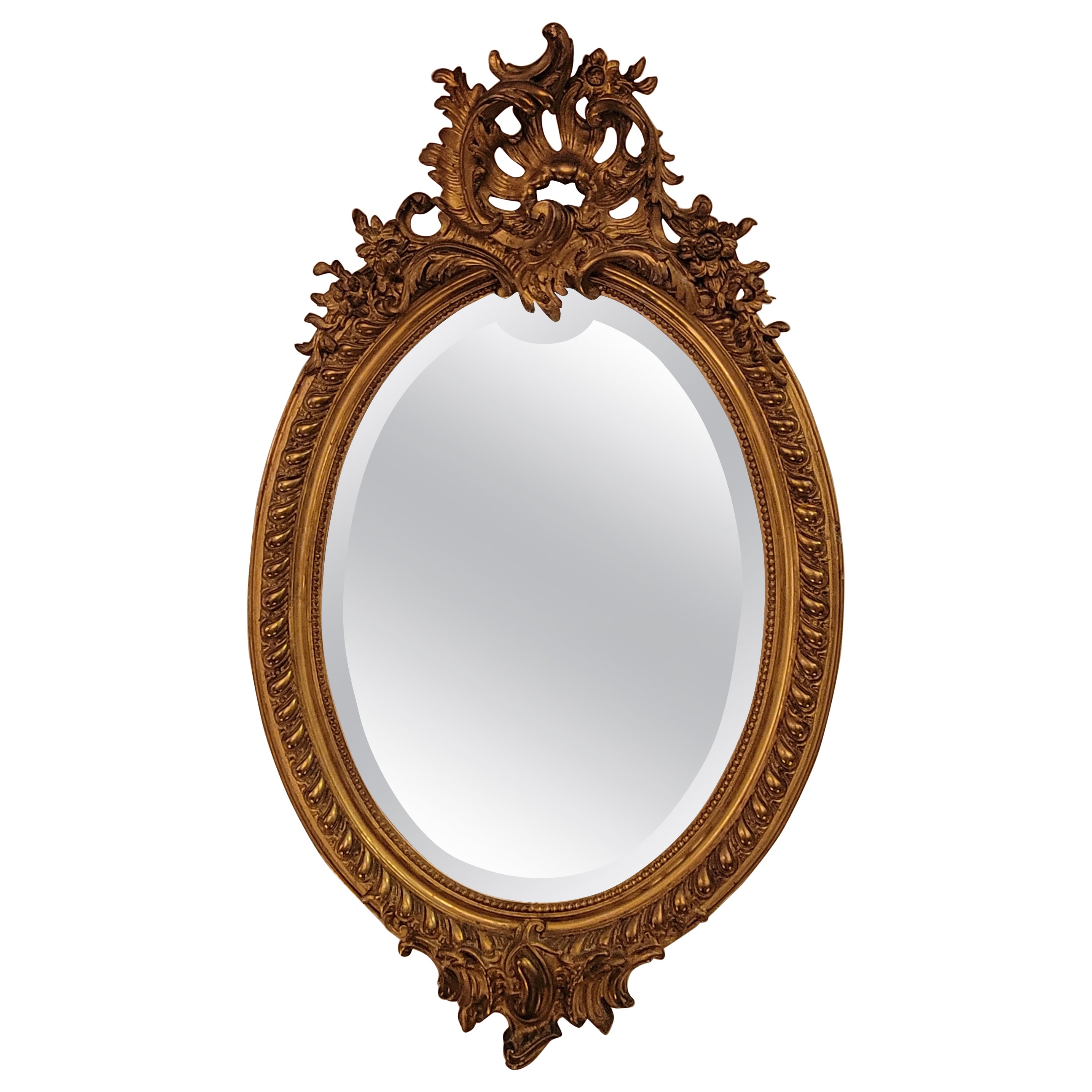 Antique French Oval Shaped Gold-Leaf Framed Mirror with Beveling, Circa 1895.