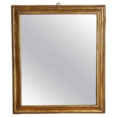 Specchio da parete in legno dorato sagomato, italiano, periodo tardo barocco, 1700 ca.
