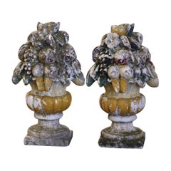 19th Century Pair of French Carved Weathered Outdoor Vases with Fruit Decor