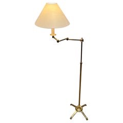 Brass removable reading lamp in the style of Maison Jansen