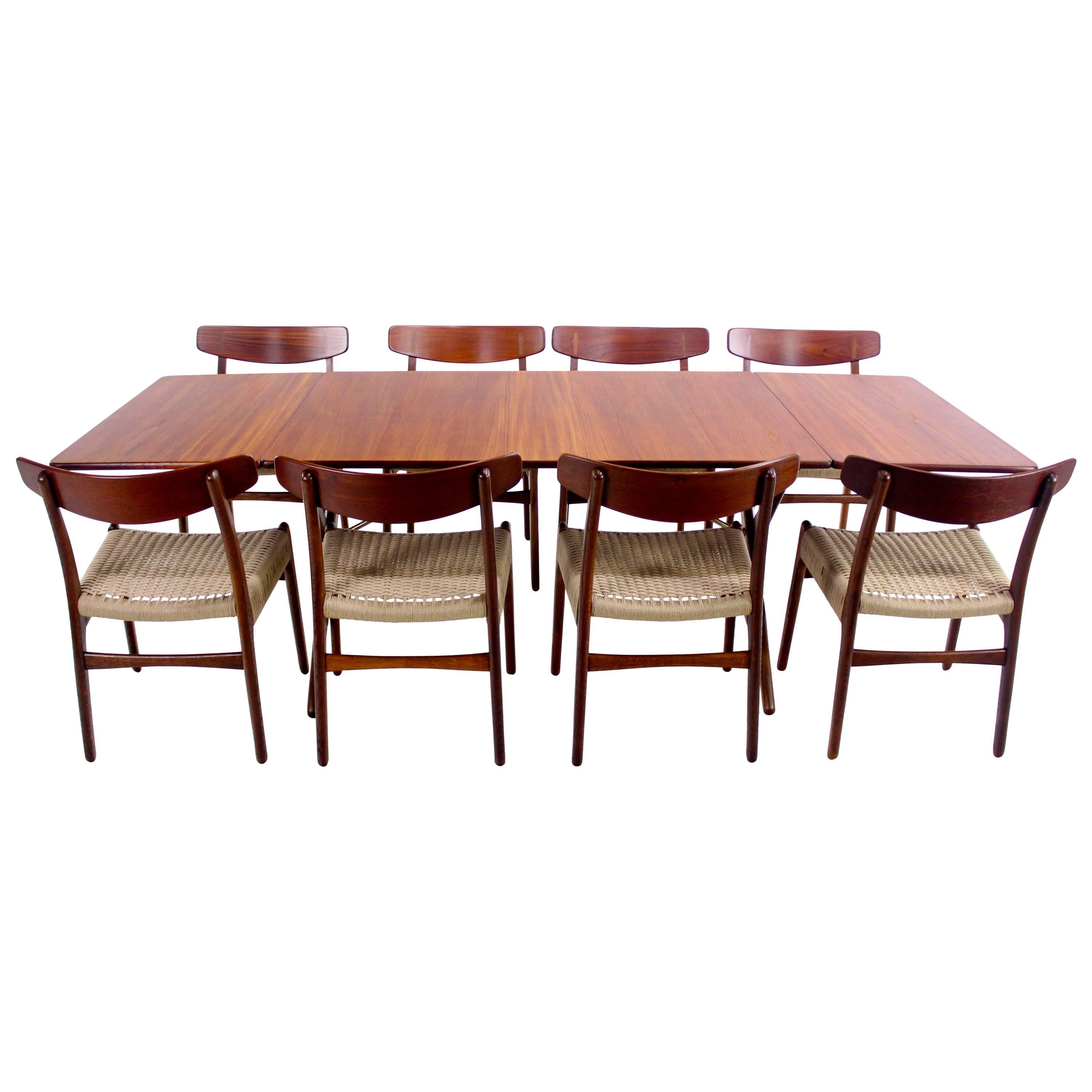 Danish Modern Eight Chair Dropleaf Dining Set Designed by Hans Wegner For Sale