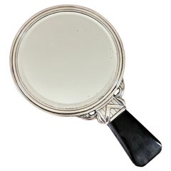 Swedish art deco handheld vanity mirror, nickel silver and wood, 1930s