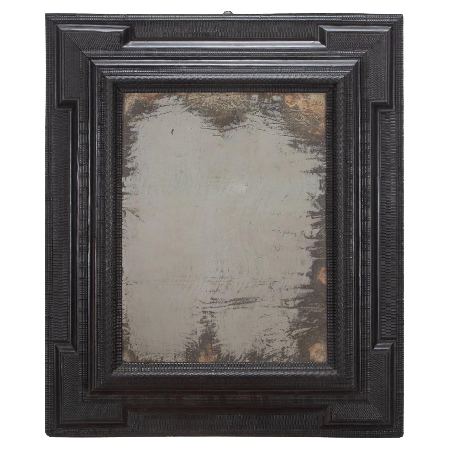 Grand miroir italien du 17ème siècle en bois d'ébène