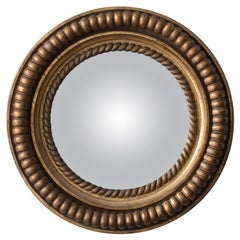Specchio convesso in legno dorato di piccole dimensioni