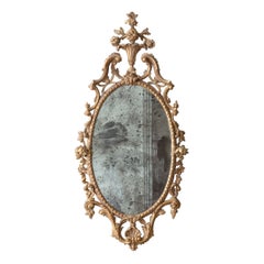 Miroir ovale en bois doré sculpté, milieu et fin du XVIIIe siècle