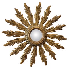 Antique French  Sunburst  mirror  eye porthole glass , carved and gilded wood