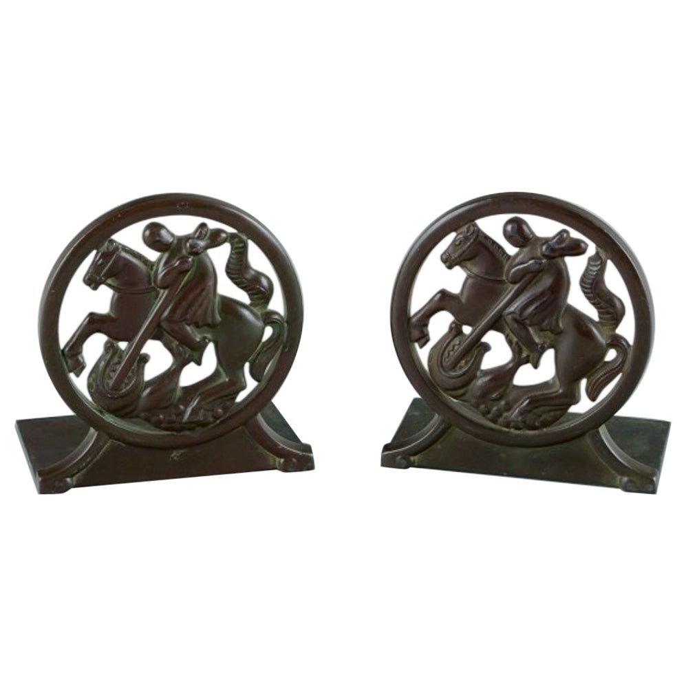 Just Andersen, Denmark. Pair of Art Deco bookends in "disko" metal.