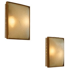 Pair of wall sconces in painted metal, brass, and frosted glass, Italy, 1950s