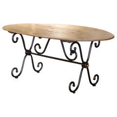 Vintage French Carved Pine Oval Dining Table on Polished Iron Base