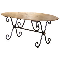 Vintage French Carved Pine Oval Dining Table on Polished Iron Base