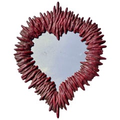 A 19th-Century Heart-Shaped Red Lacquered Liturgical Mirror