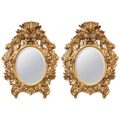 Pair of 18th Century Baroque Carved and Gilded Mirrors