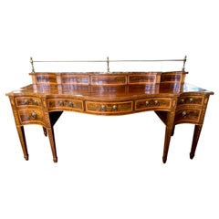 THE Finest late 18th C. inlaid flame mahogany Hepplewhite Serpentine Sideboard